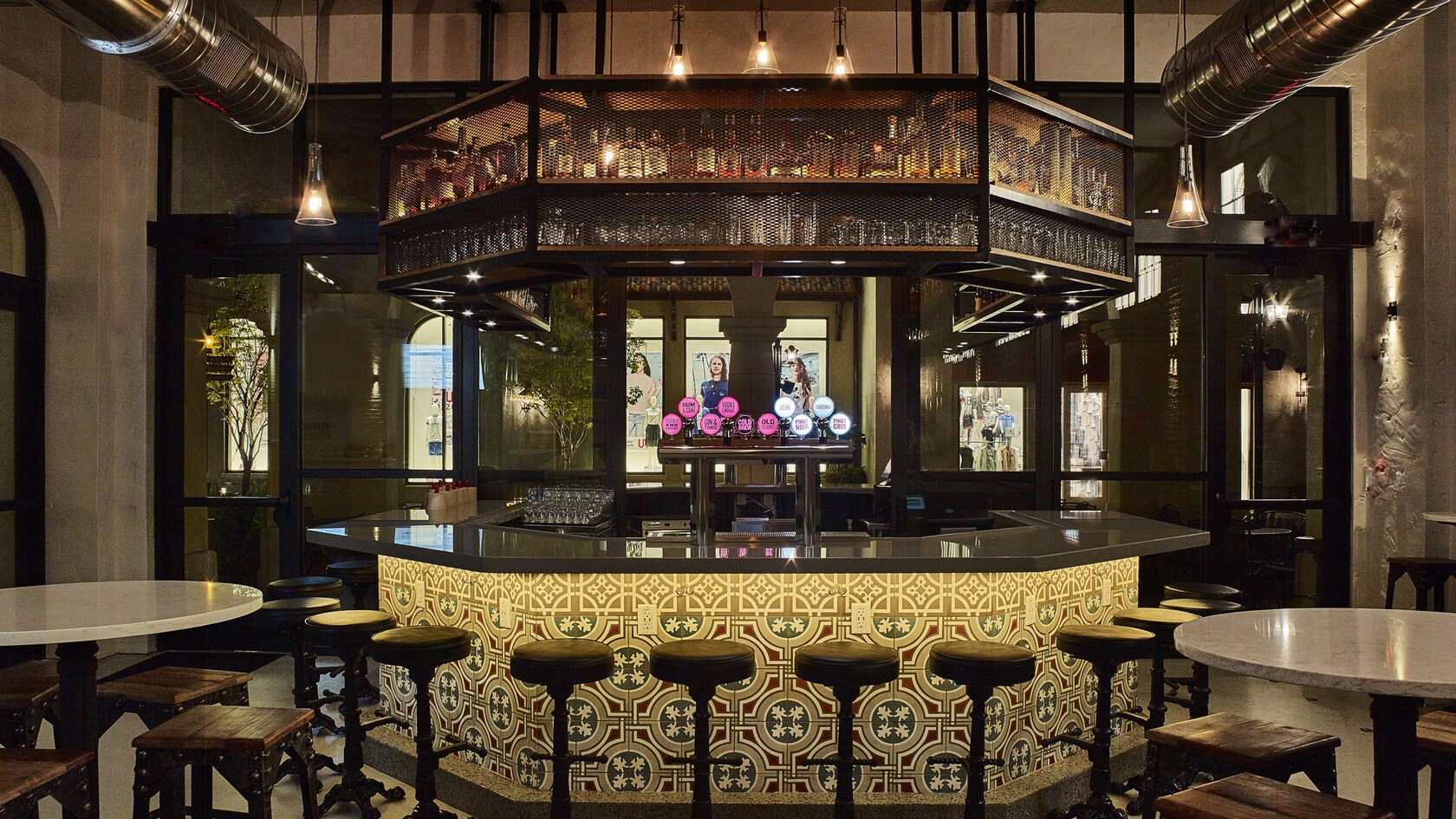 The illuminated bar area at The Polite Pig