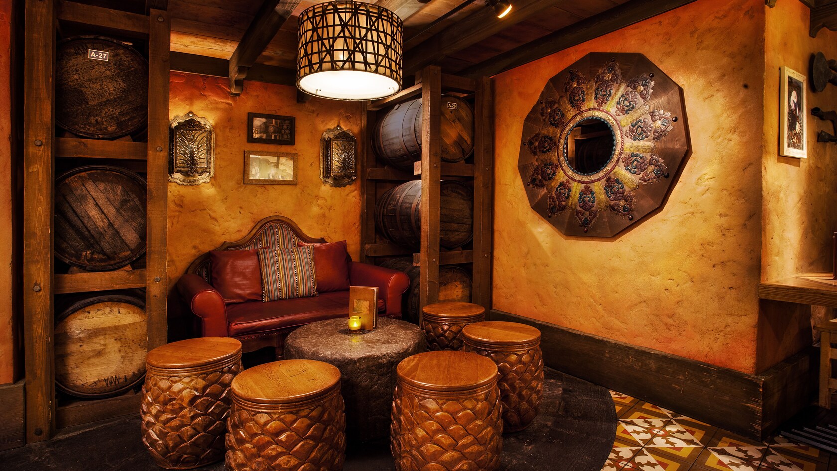 Lounge area with sofa, drum-shaped seats and table