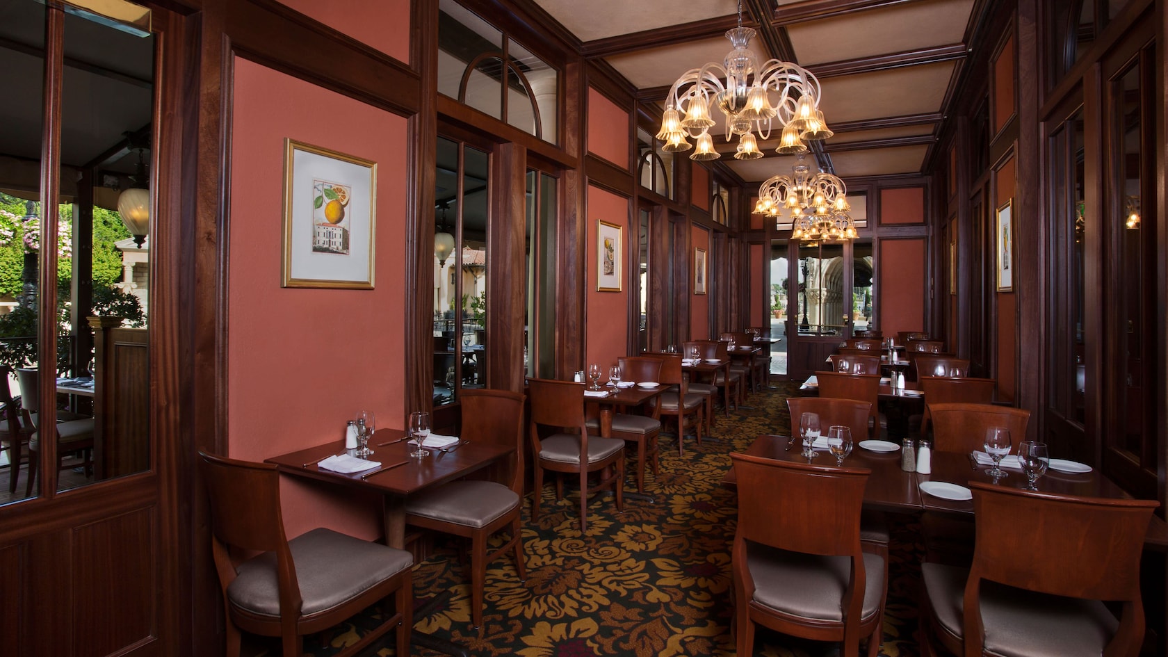 Narrow dining room with windows facing a veranda