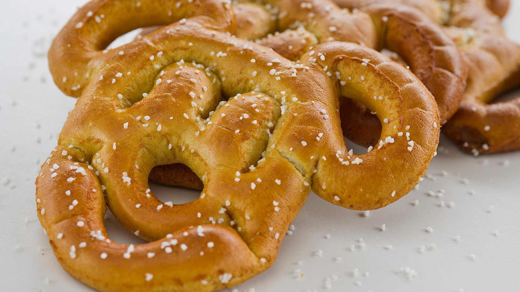 Hot Mickey-shaped soft pretzels with salt