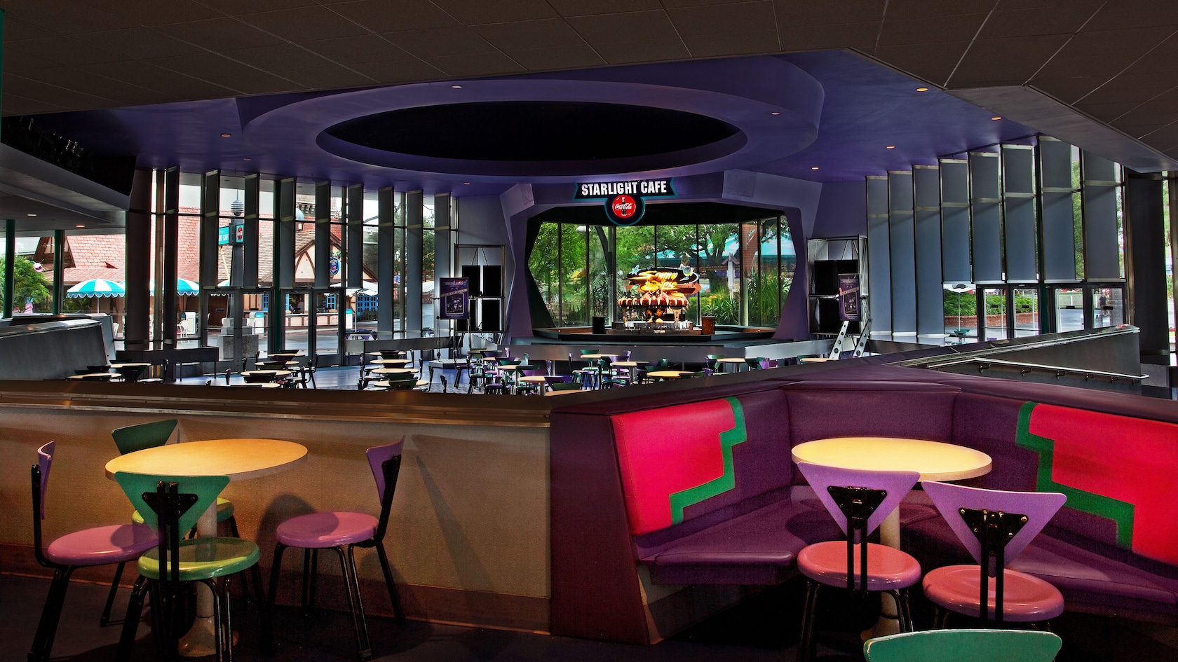 Dining area looking down on sunken dining room and stage at Cosmic Ray's Starlight Café