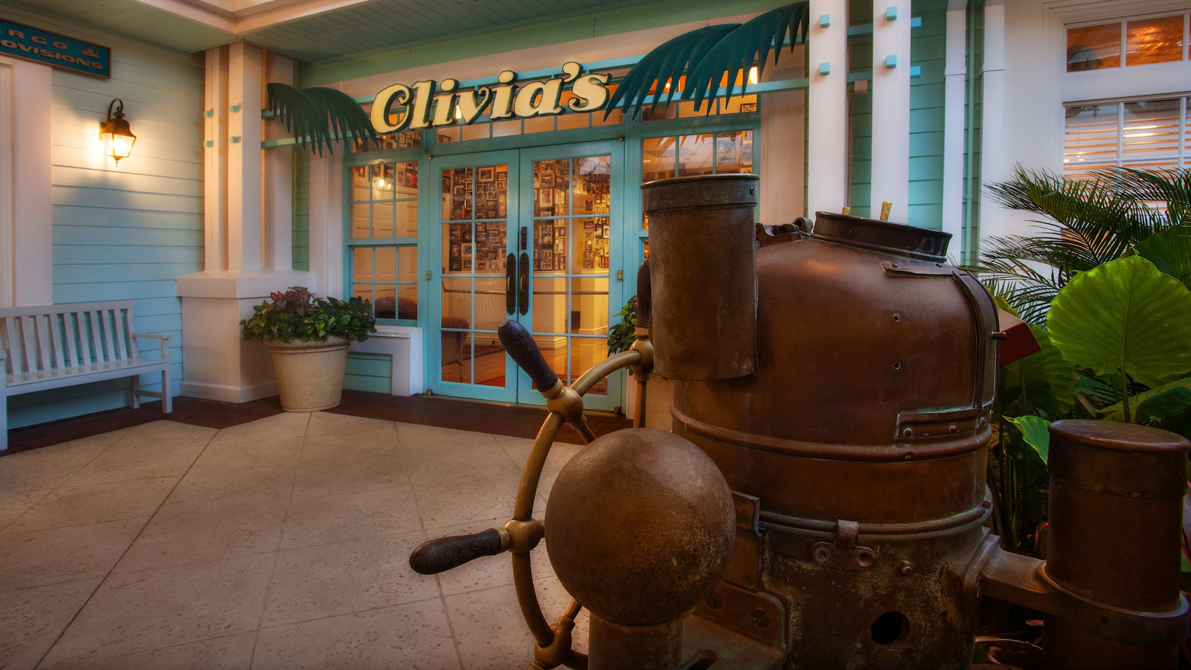 Antique copper steering wheel and column outside Olivia's Cafe