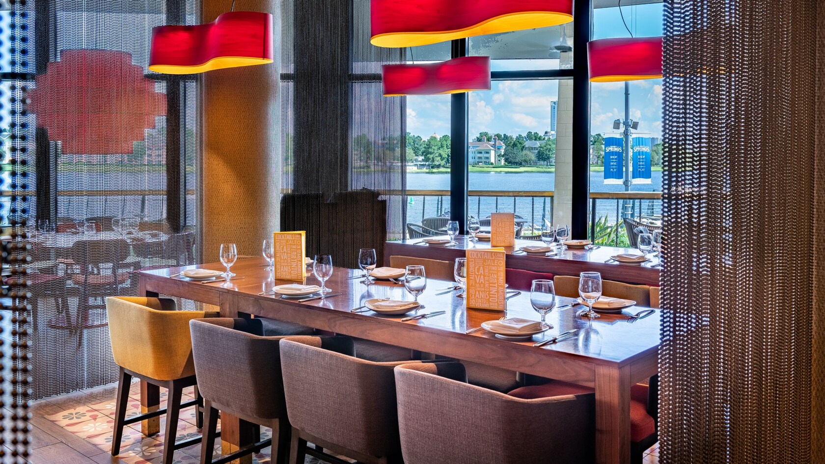 Set tables near the windows at Jaleo by José Andrés at Disney Springs