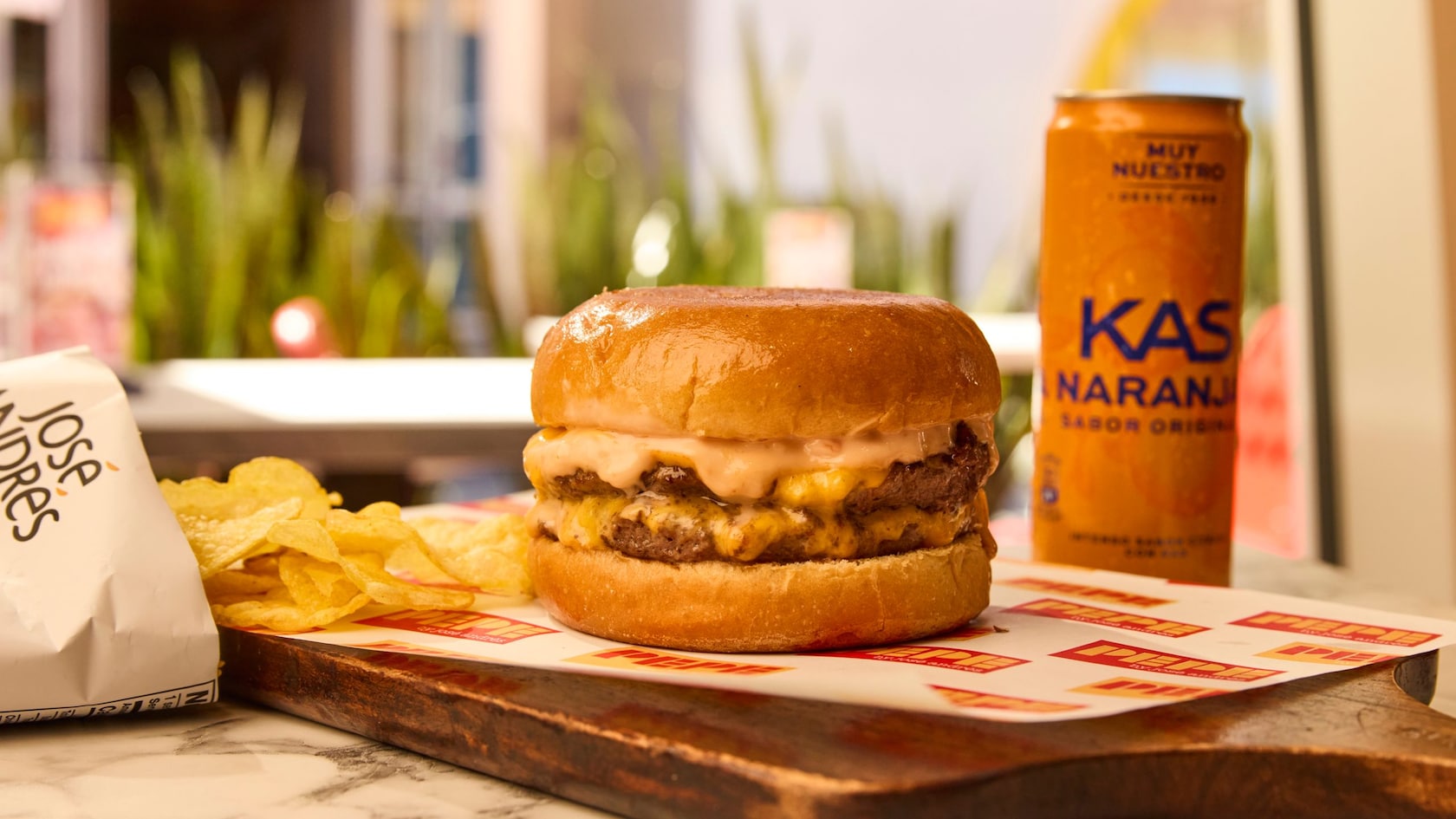 The Pepe Burger, José's Chips and a Kas Orange Soda from Pepe by José Andrés