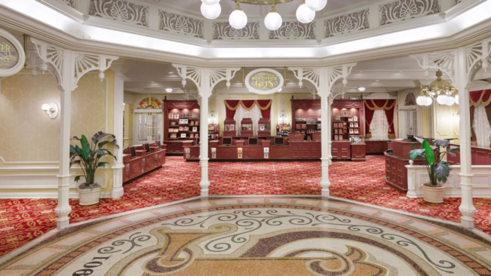 Elegant lights and ornate flooring inside Box Office Gifts at Magic Kingdom park