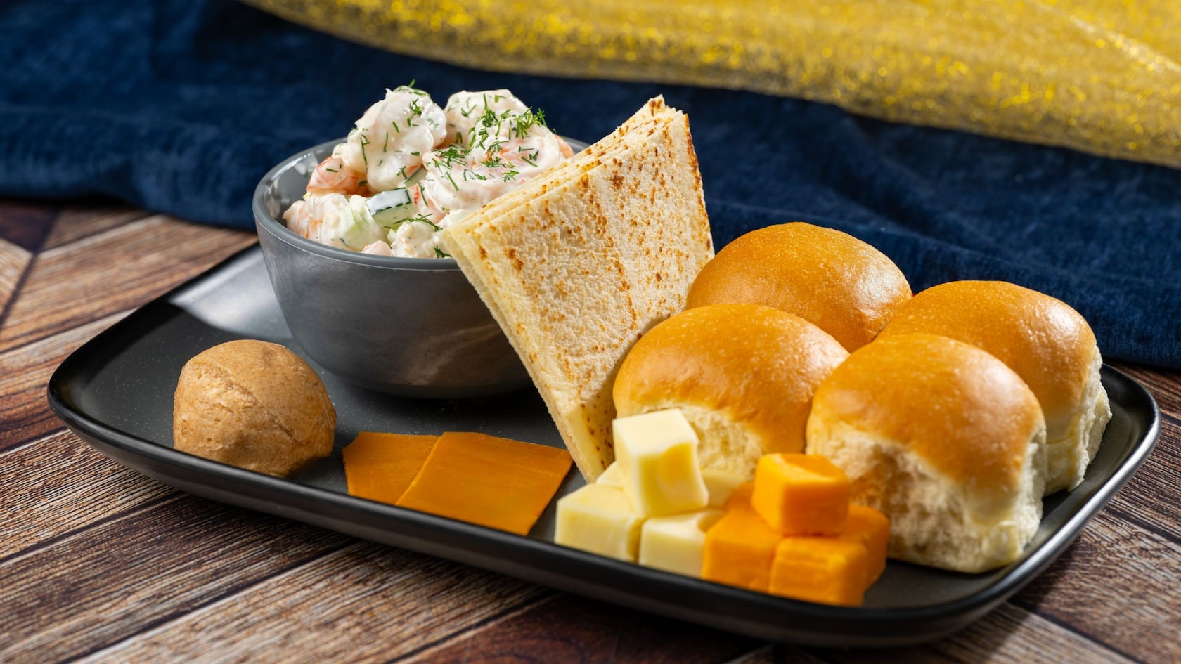 Lefse with cinnamon butter, cheeses, rolls and chilled Nordic shrimp salad from Akershus Royal Banquet Hall
