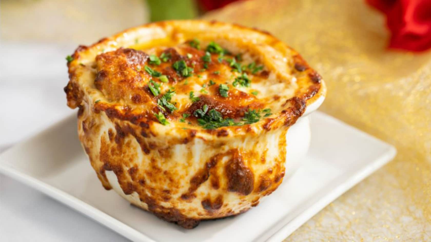 A bowl of French Onion Soup from Be Our Guest