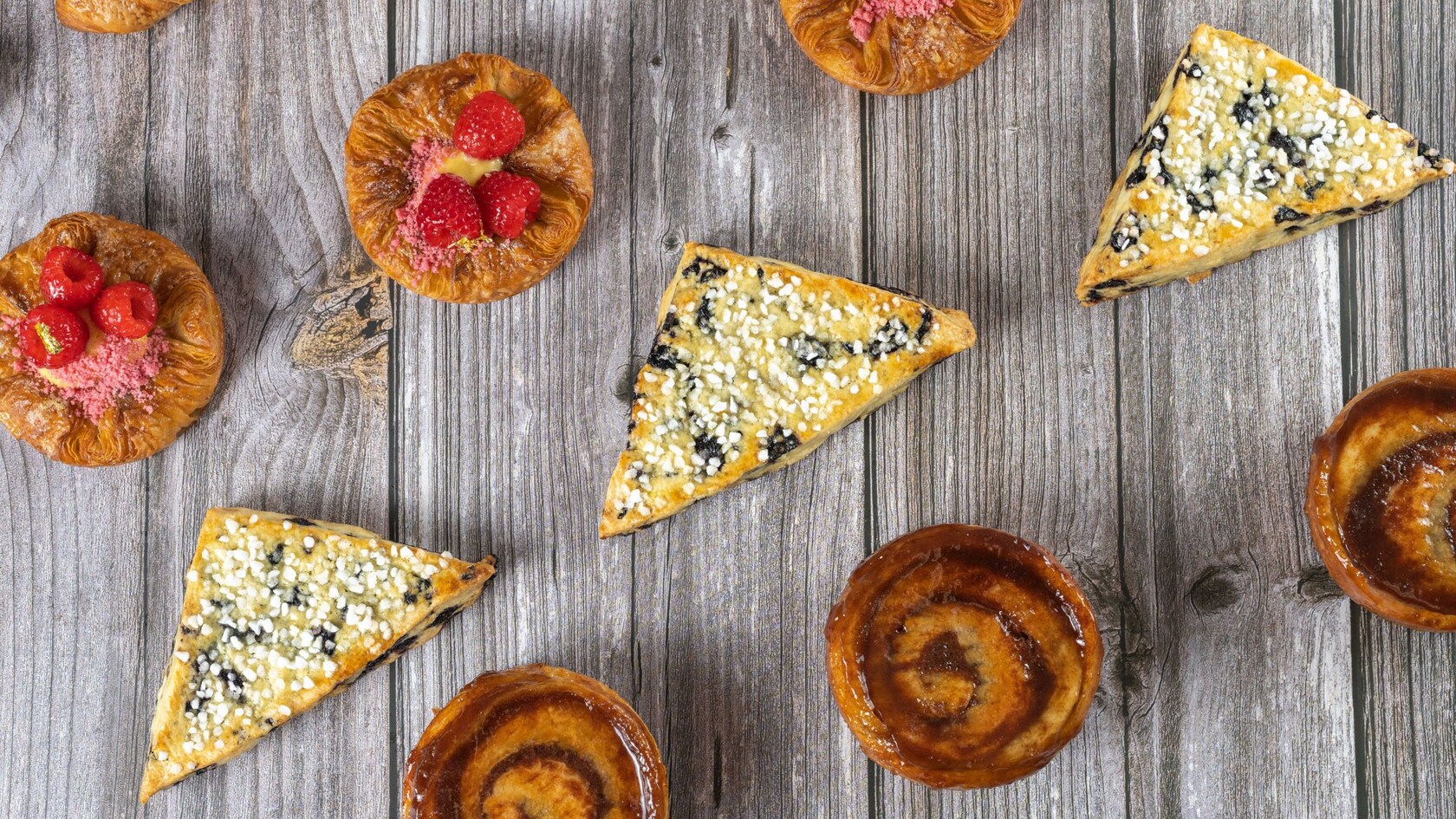 Four rows of croissants and other pastries