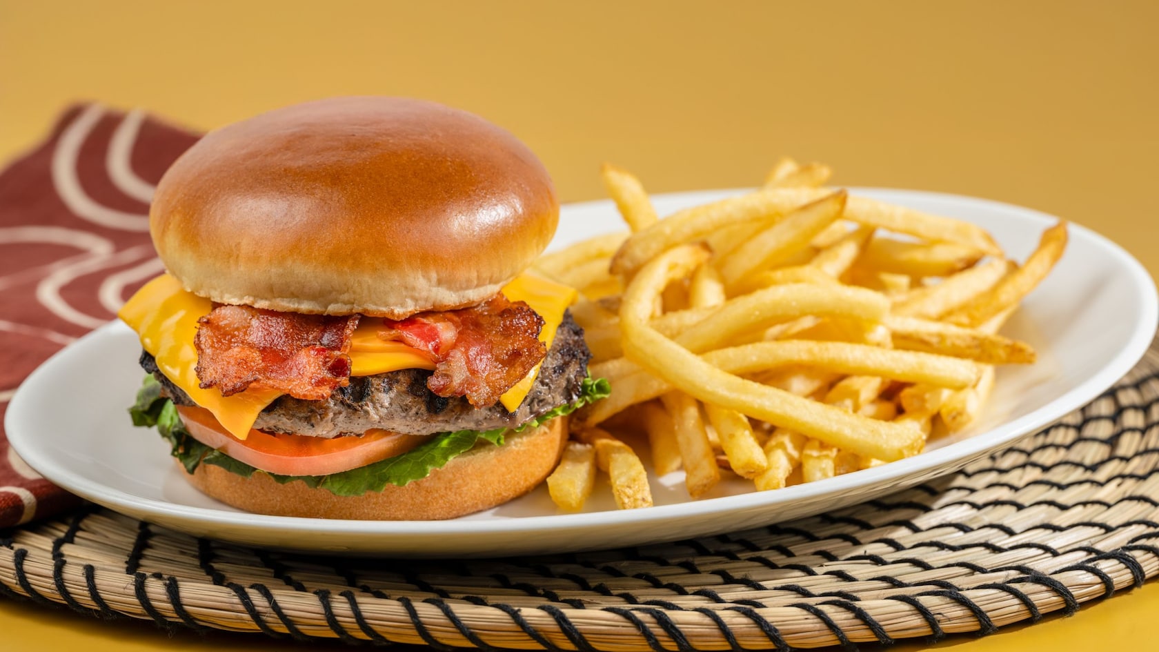 A Bacon Cheeseburger with fries from Harambe Market at Disney’s Animal Kingdom theme park