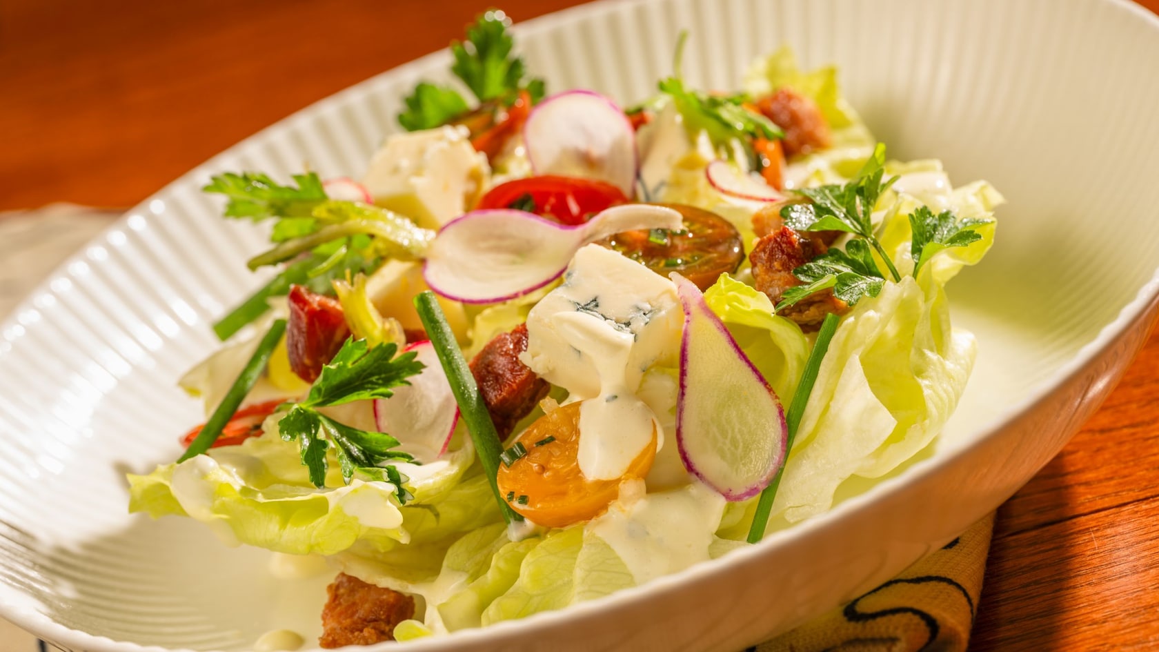 A serving of Steakhouse Wedge Salad from Le Cellier Steakhouse in Epcot