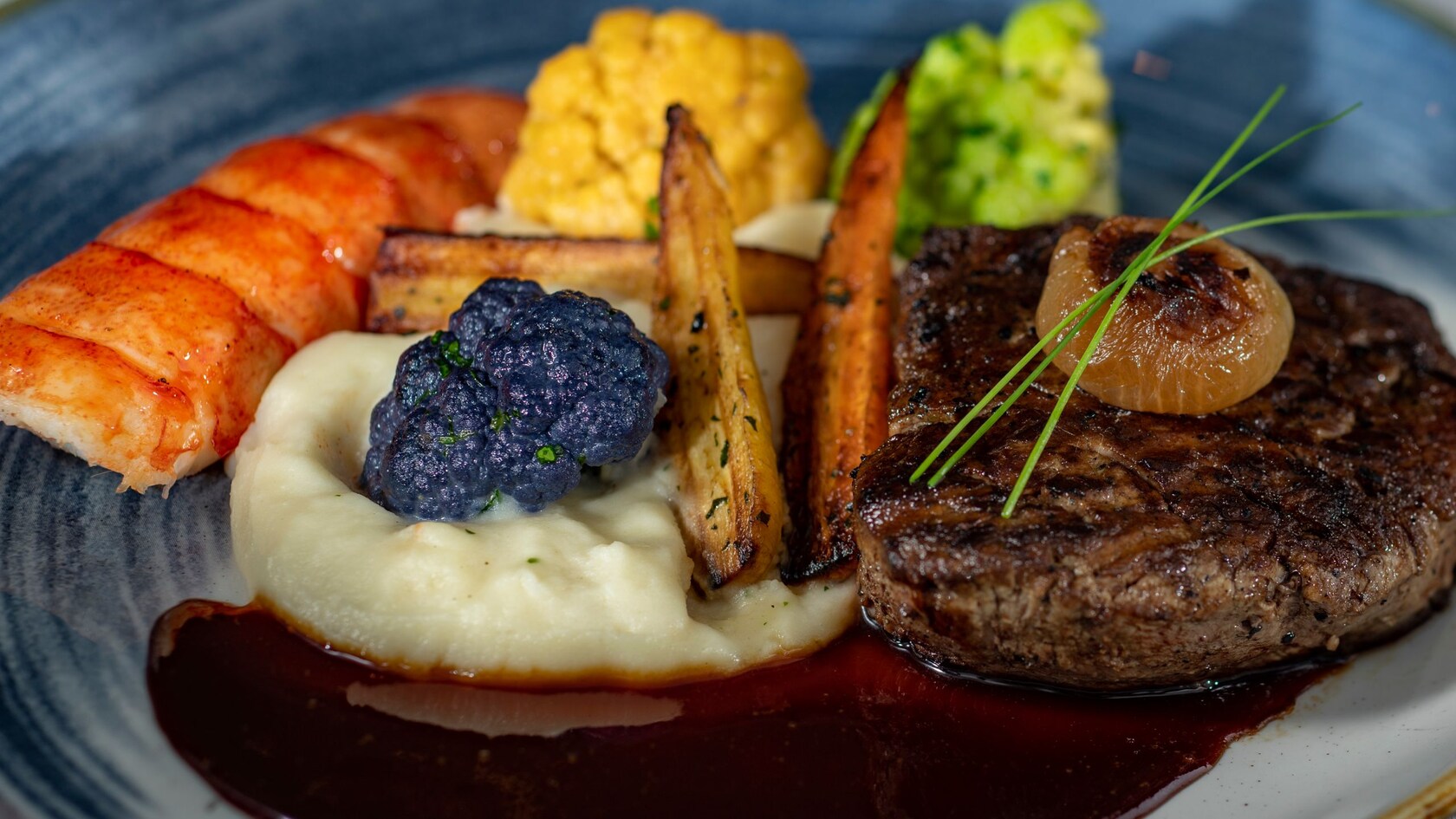 Filet Mignon served with a Lobster Tail and mashed potatoes 