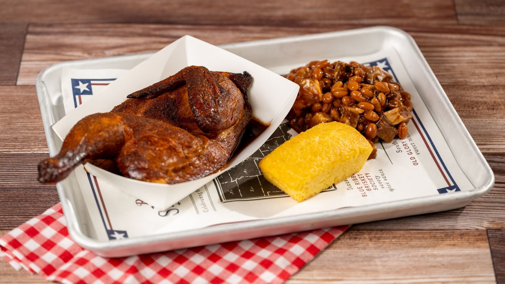 Kansas City Smoked Half Chicken, Cornbread, and Baked Beans with Burnt Ends from Regal Eagle Smokehouse Craft Drafts and Barbecue