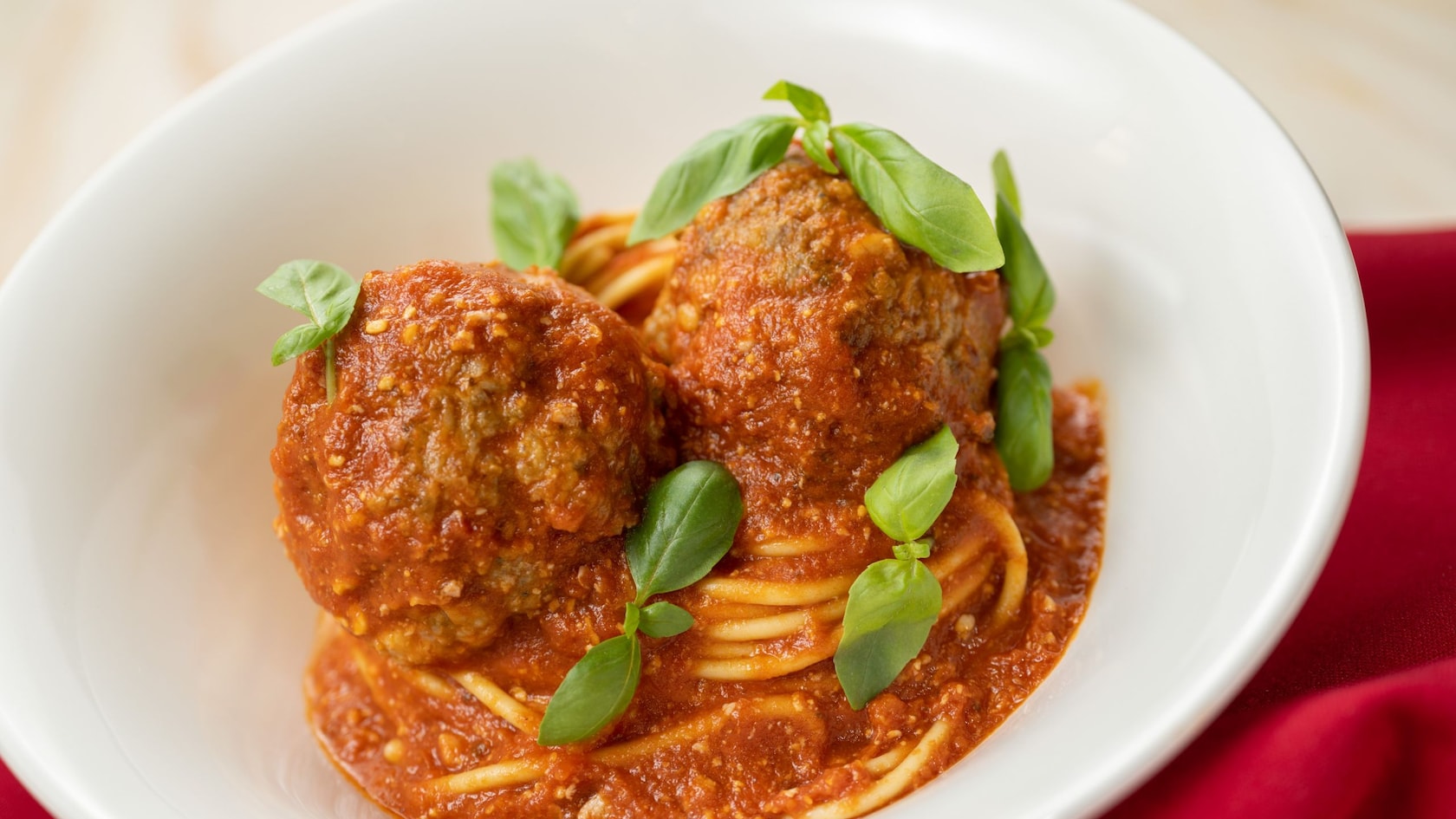 Beef and pork meatballs atop spaghetti with marinara sauce