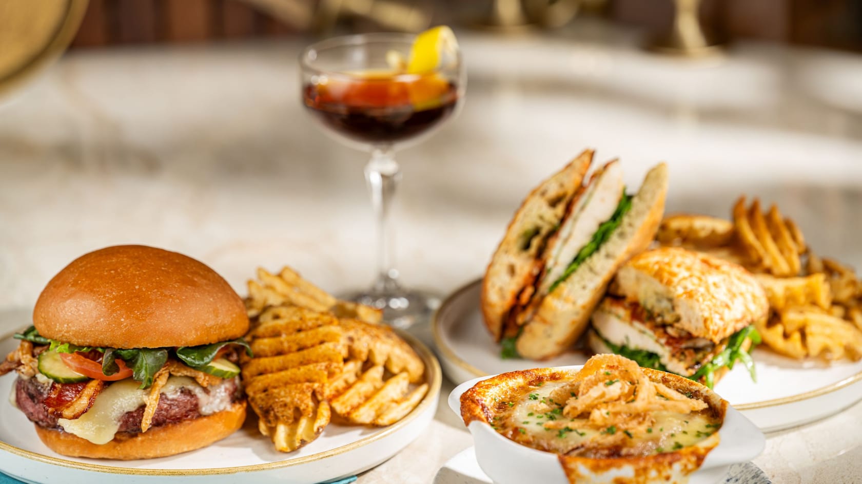 Turf Club Burger, Herbed Grilled Chicken Sandwich and French Onion Soup at The Turf Club Bar & Grill