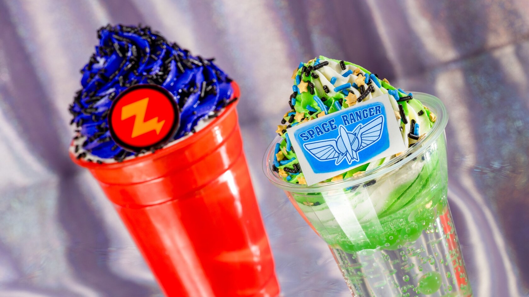 A Buzz Lightyear themed float and Zurg themed shake, each topped with sprinkles