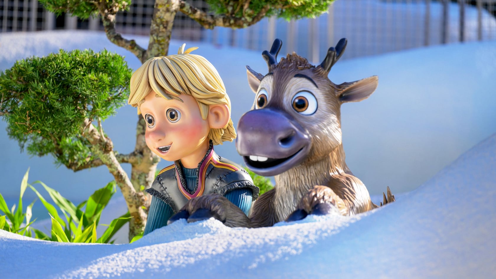 Esculturas de los jóvenes Kristoff y Sven en el parque infantil acuático Tike's Peak, en Disney's Blizzard Beach Water Park