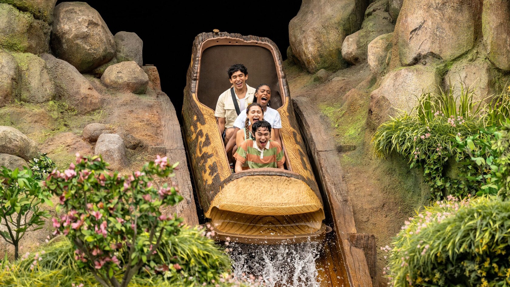 Guests riding Tiana's Bayou Adventure at Disneyland Resort