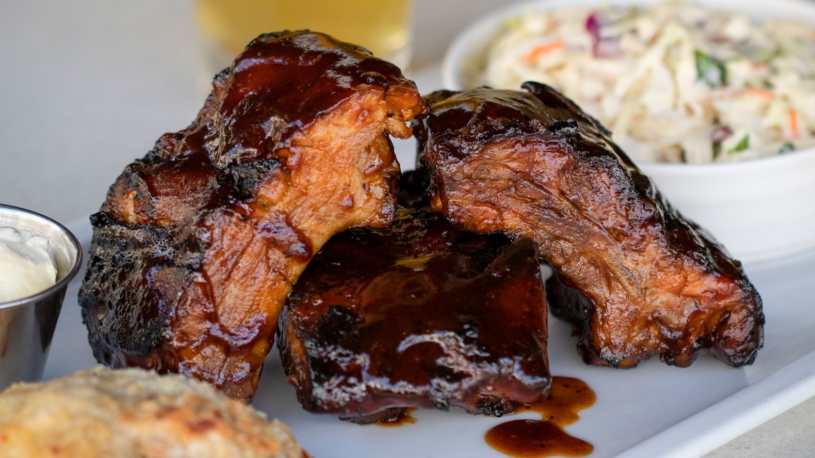 A plate with ribs and a biscuit