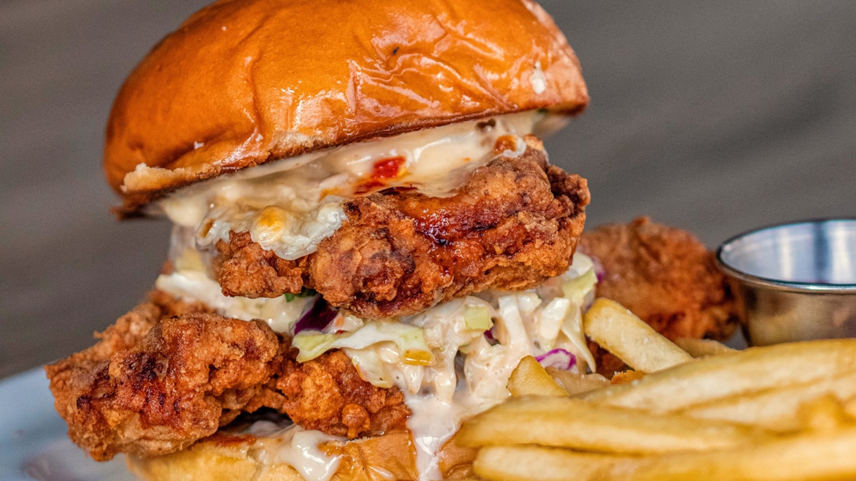 A chicken sandwich with fries