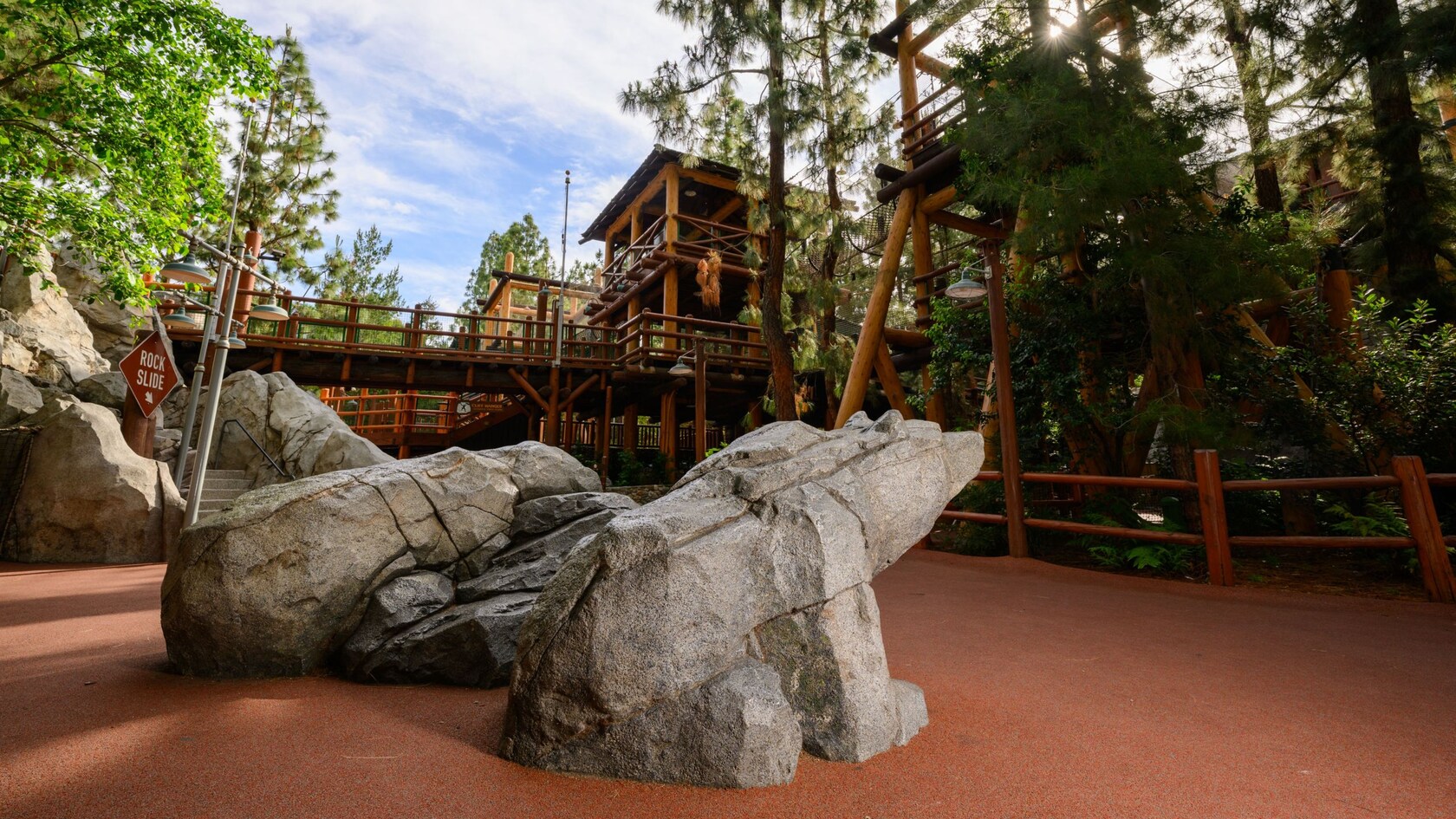 Rock formations sculpted to look like bears in the Boulder Bears section of the trail, with lookout towers in the background