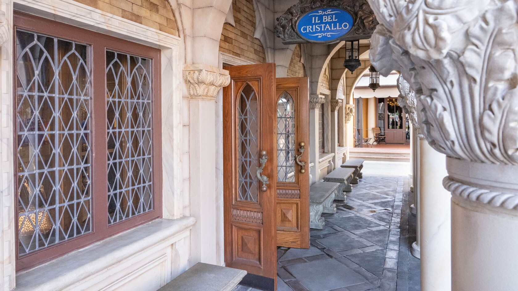 The colonnade of the main entrance and sign to Il Bel Cristallo located in World Showcase at Epcot
