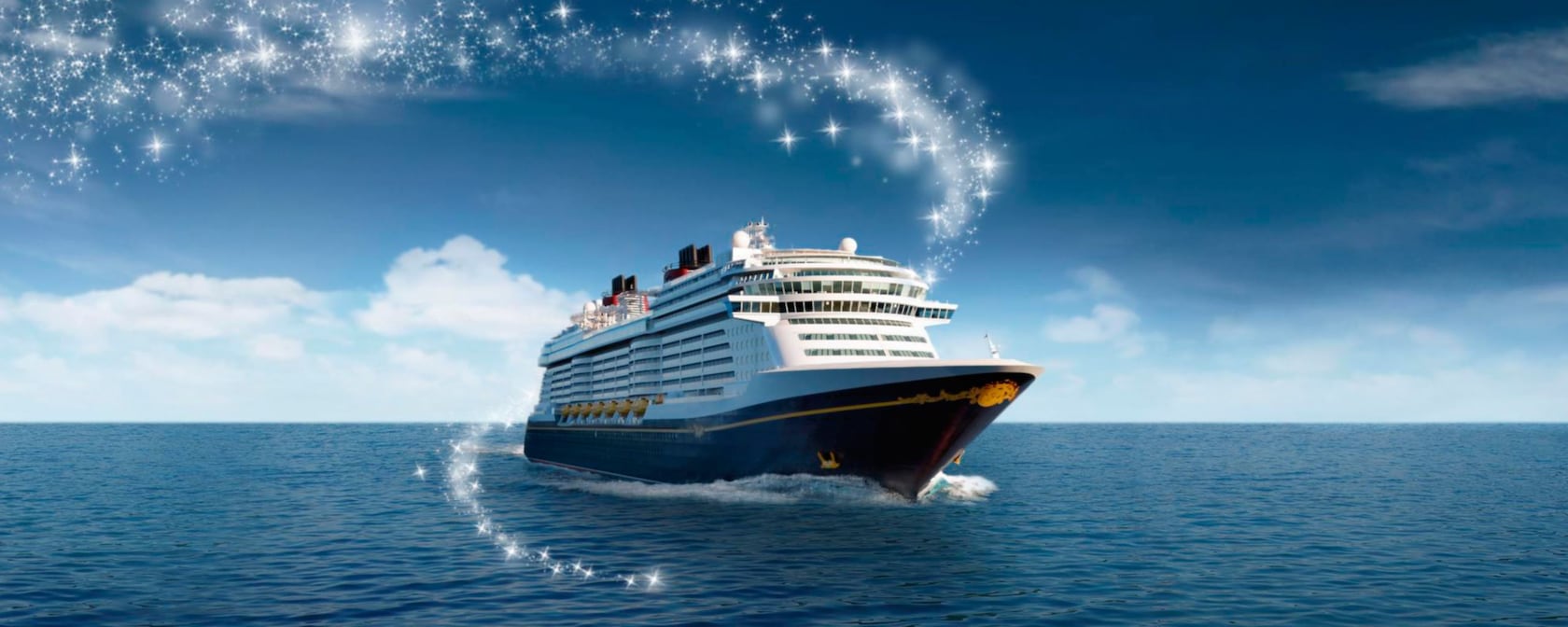 The Disney Wish, the newest of the Disney Cruise Line ships, sails along amid plumes of pixie dust
