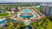 Panoramic view of the outdoor pool area and its surroundings at Embassy Suites by Hilton Orlando Sunset Walk