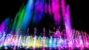 Mist streams, exploding fountains and dancing lights during World of Color
