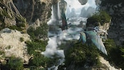A boy flies with Na'vi and Mountain Banshees through the skies over Pandora