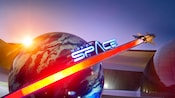 A logo outside a building that reads Mission Space, with a rocket ship and a globe
