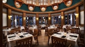 The inside of Yachtsman Steakhouse with set tables and chairs