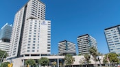 The multi story Renaissance Barcelona Hotel stands amid several high rises