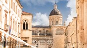A medieval town with a domed church