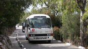 A minibus filled with passengers