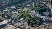 An amusement park featuring roller coasters, a free fall attraction and other thrill rides