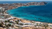 A beach cove dotted with Greek architecture