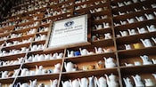 Shelves lined with teapots