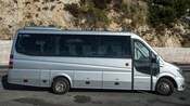 The side of a late model minibus