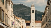 A bustling city center with medieval architecture