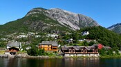 Waterfront village at the bottom of a mountain