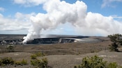 A plume of steam fills the air at a volcanic vent