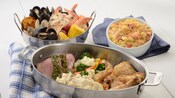 The dinner offerings at Cape May Cafe, including the Seafood Boil, with mussels, shrimp and clams, the Turf Platter, with steak and chicken, and the Lobster Mac and Cheese