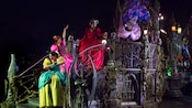 Disney villains congregate on a spooky parade float
