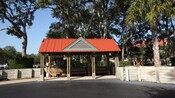 Shuttle stop shelter with wooden benches