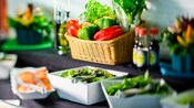 Baskets and bowls filled with fresh vegetables