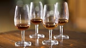 4 glasses containing various types of Cognac