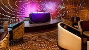 The District Lounge has a stage with microphones and sound equipment set up