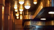 A tiered ceiling has molding in a piano keyboard design