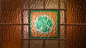 A clover in stained glass makes up part of the window of an Irish pub called O Gills