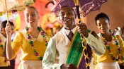 A group of festively dressed performers